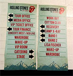 Backstage, well known signs point the way to the diffenerent chapters of the band's home on the road...